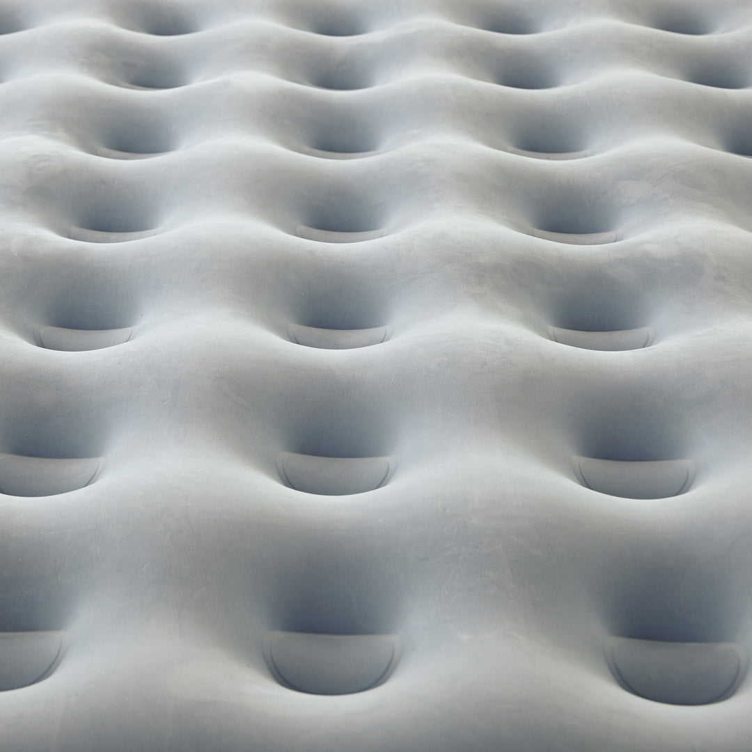 Close-up of an inflatable mattress with a grid pattern