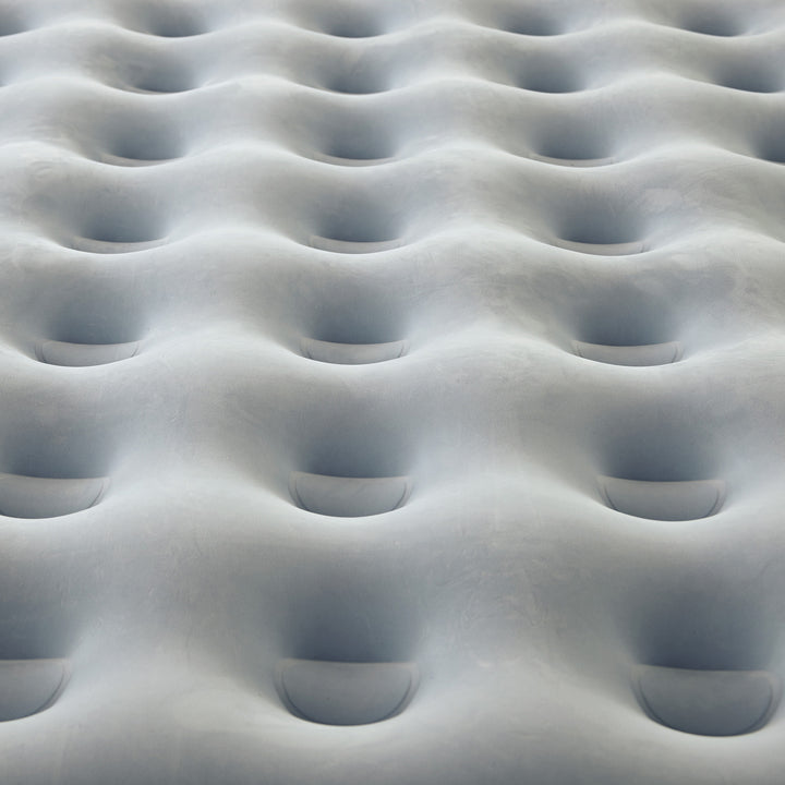 Close-up of an inflatable mattress with a grid pattern