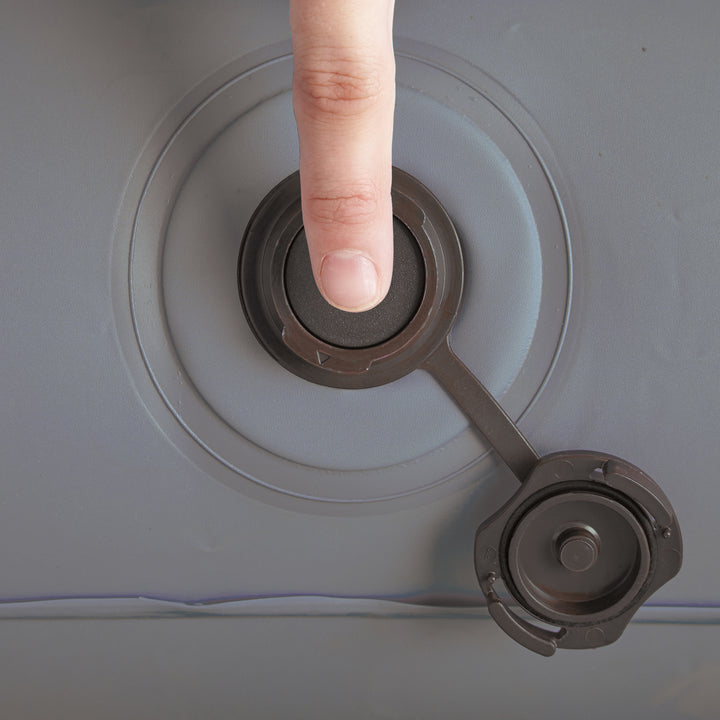 Hand pressing a button on a vehicle&