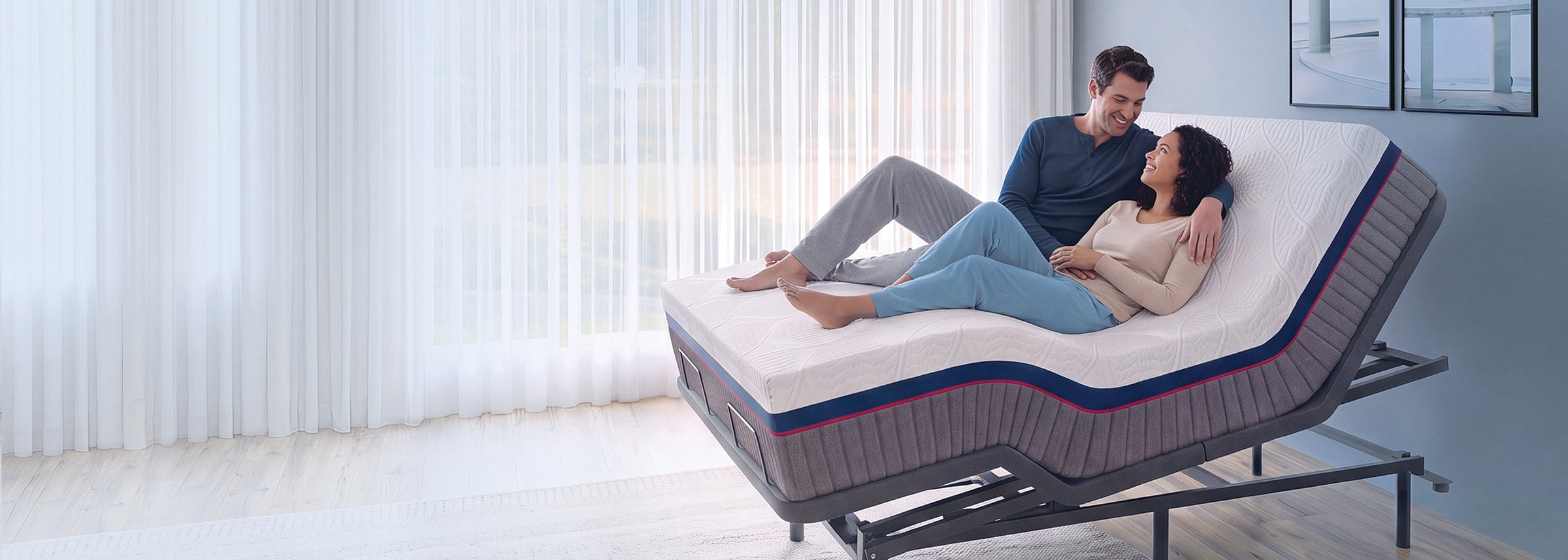 Couple sleeping peacefully on an iZone smart bed