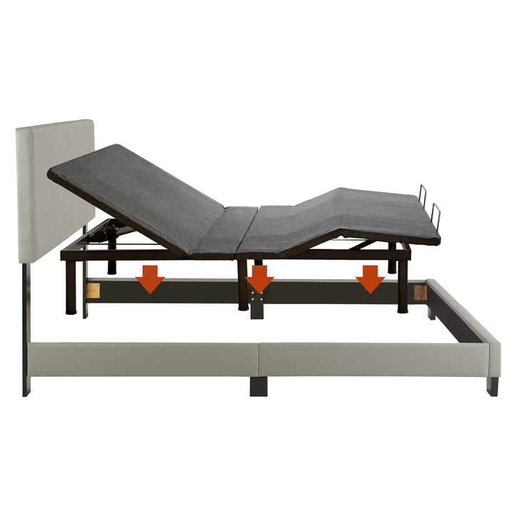 profile of adjustable power base with attached legs being lowered into a platform bed frame