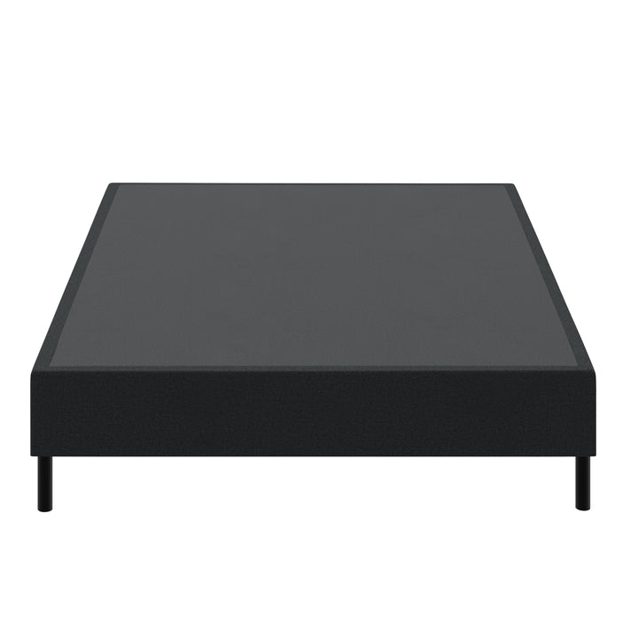 metal bed frame with black cover on white background