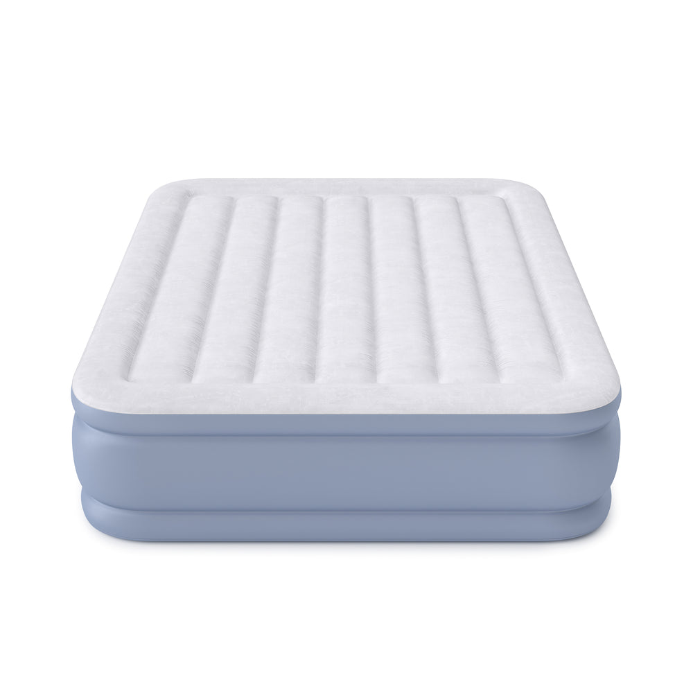 Inflatable air mattress with a white top and blue sides on a white background
