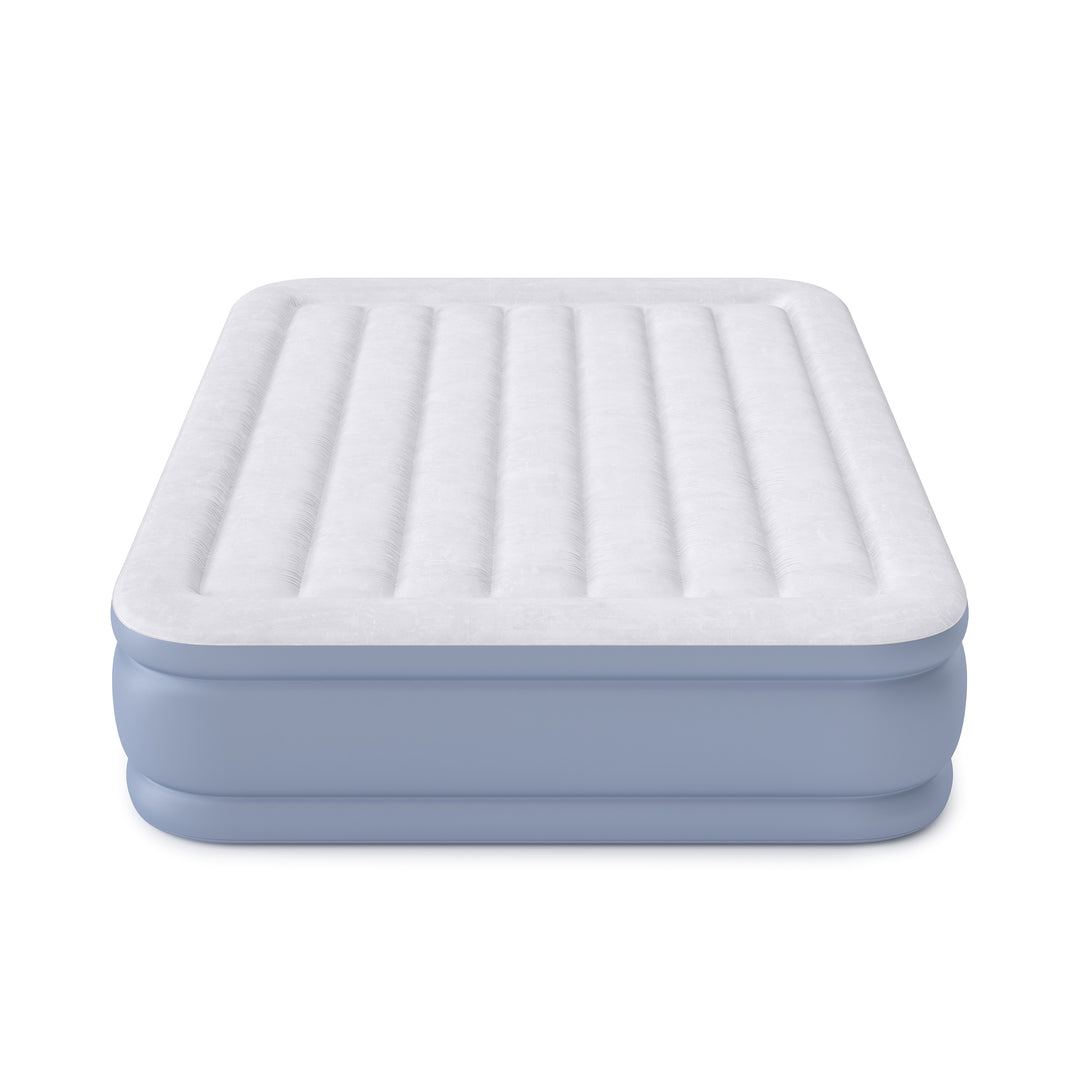 Inflatable air mattress with a white top and blue sides on a white background