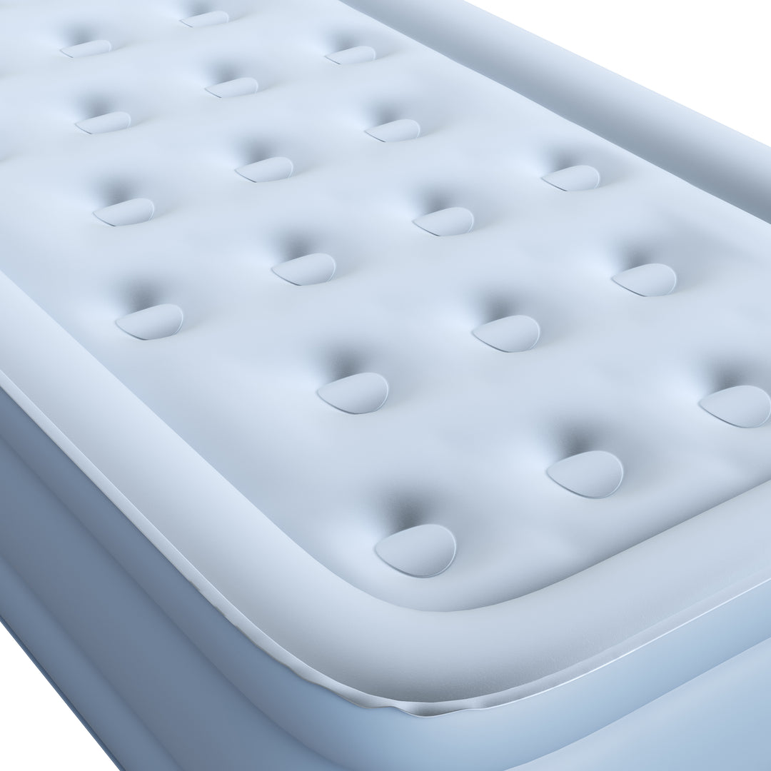 Inflatable mattress with a pattern of raised squares on a white background